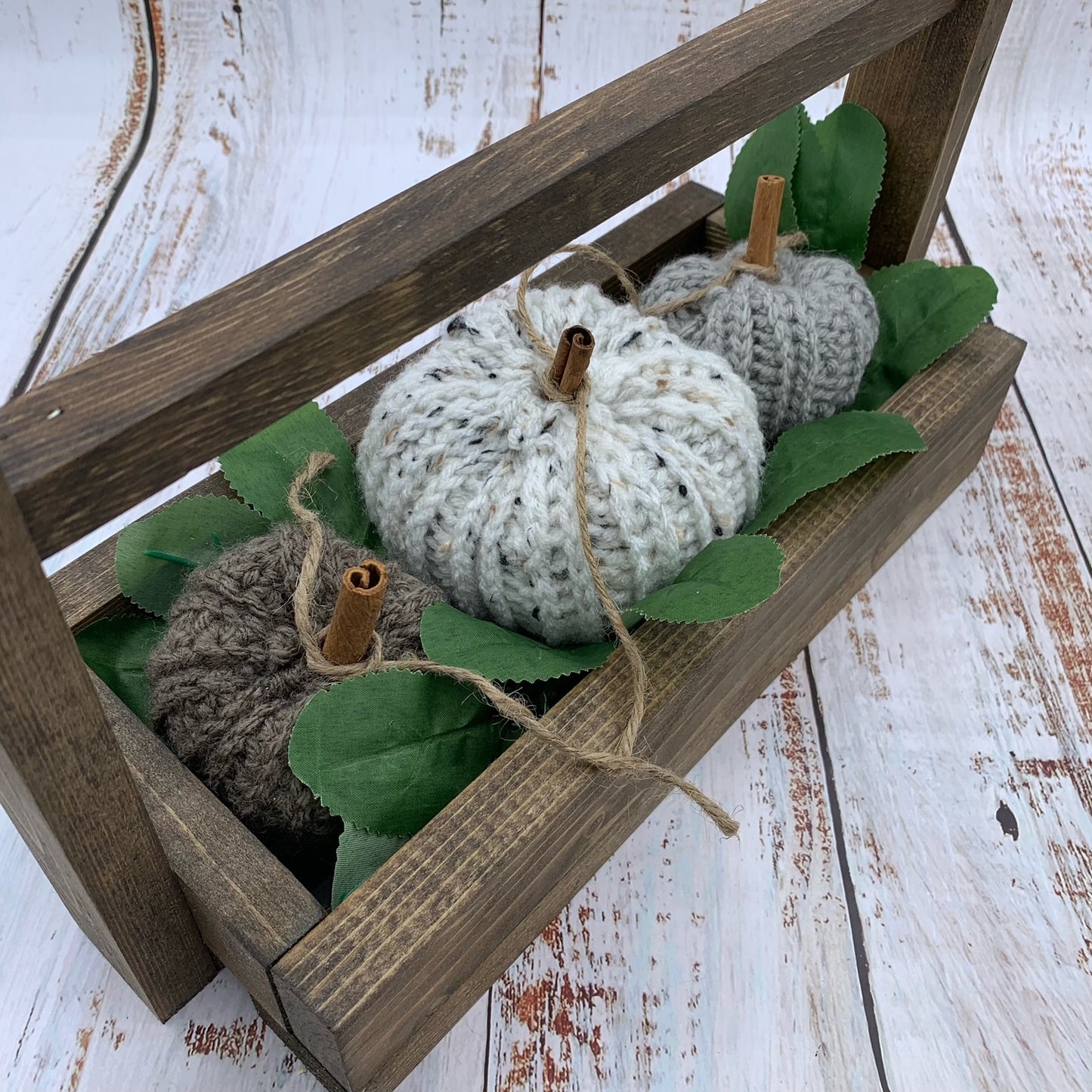 Crochet Pumpkin in Crate with Green Leaves