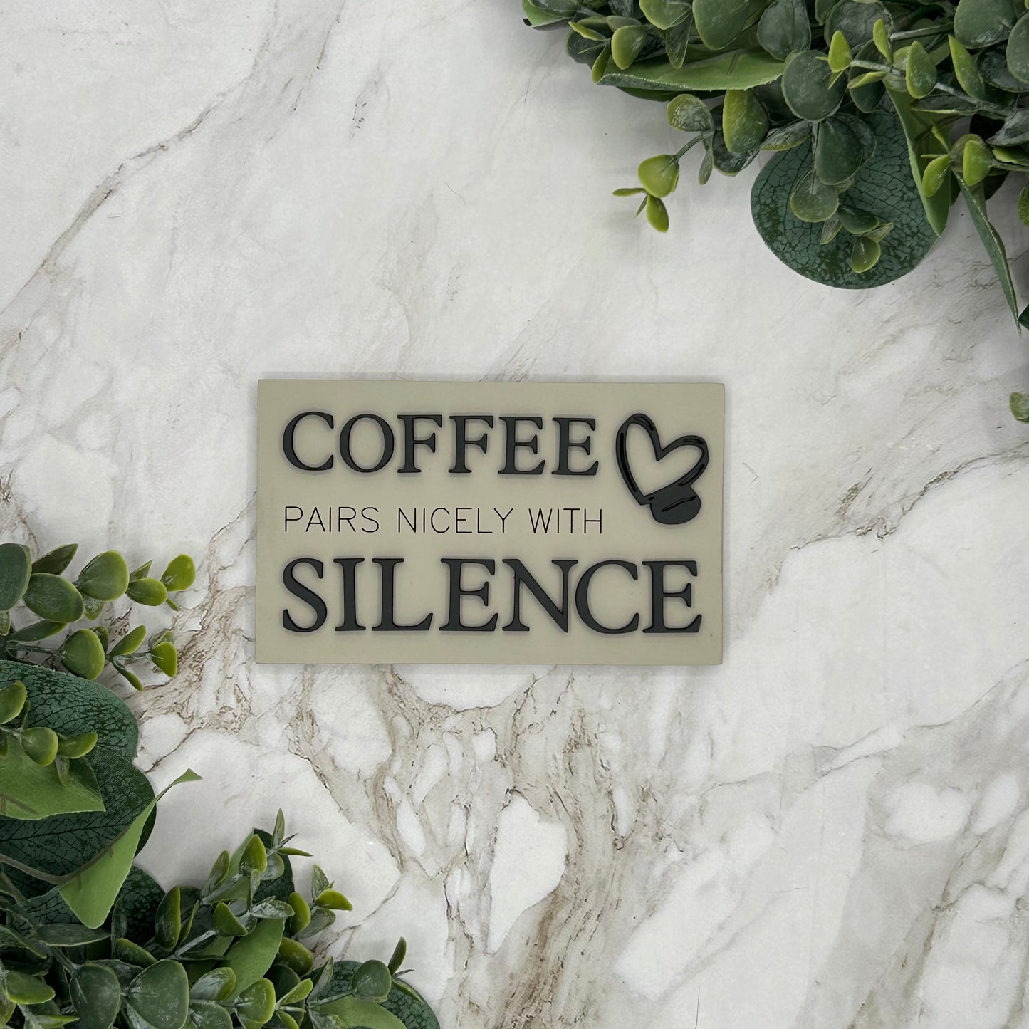 Coffee pairs nicely with Silence Sign