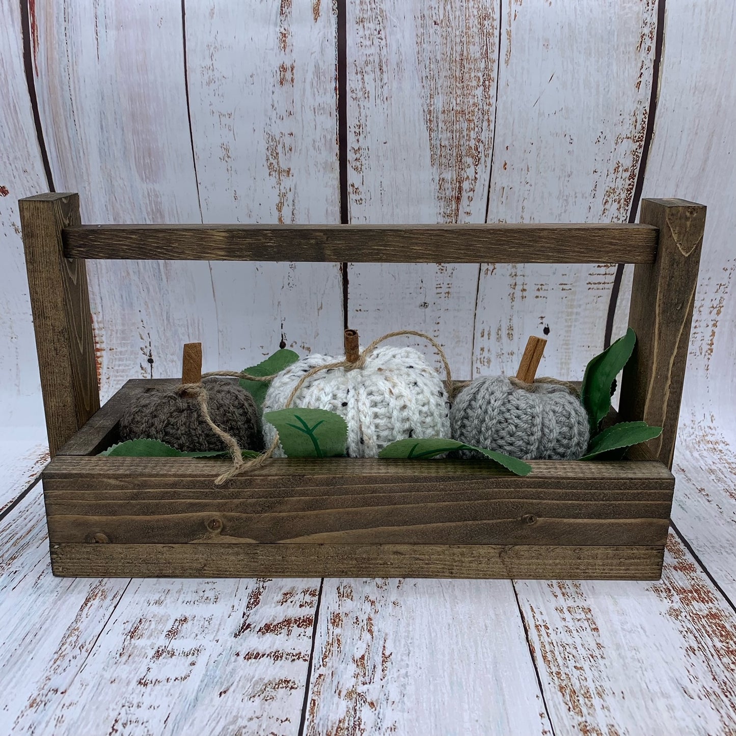 Crochet Pumpkin in Crate with Green Leaves