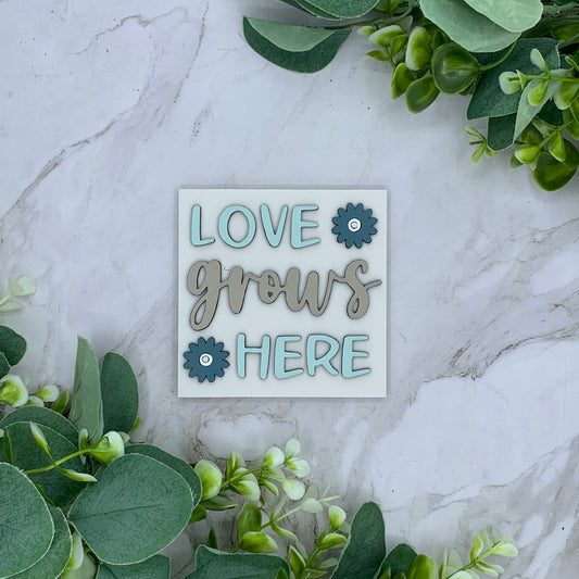 Love Grows Here Sign